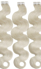 wavy platinum blonde tape hair extensions