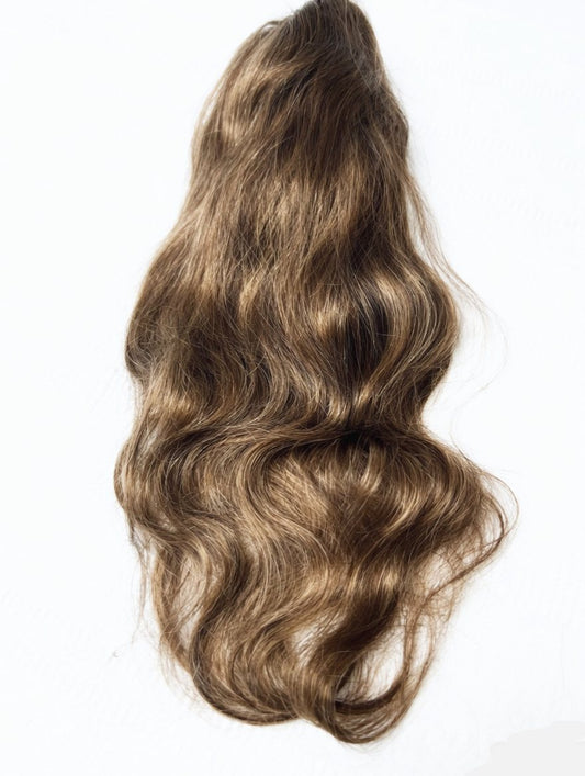 dark blonde wavy clip in hair extensions 
