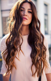 brown highlighted wavy clip in hair extensions