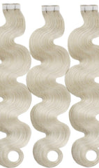 wavy platinum blonde tape hair extensions 