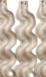 wavy ash blonde highlighted hair extensions
